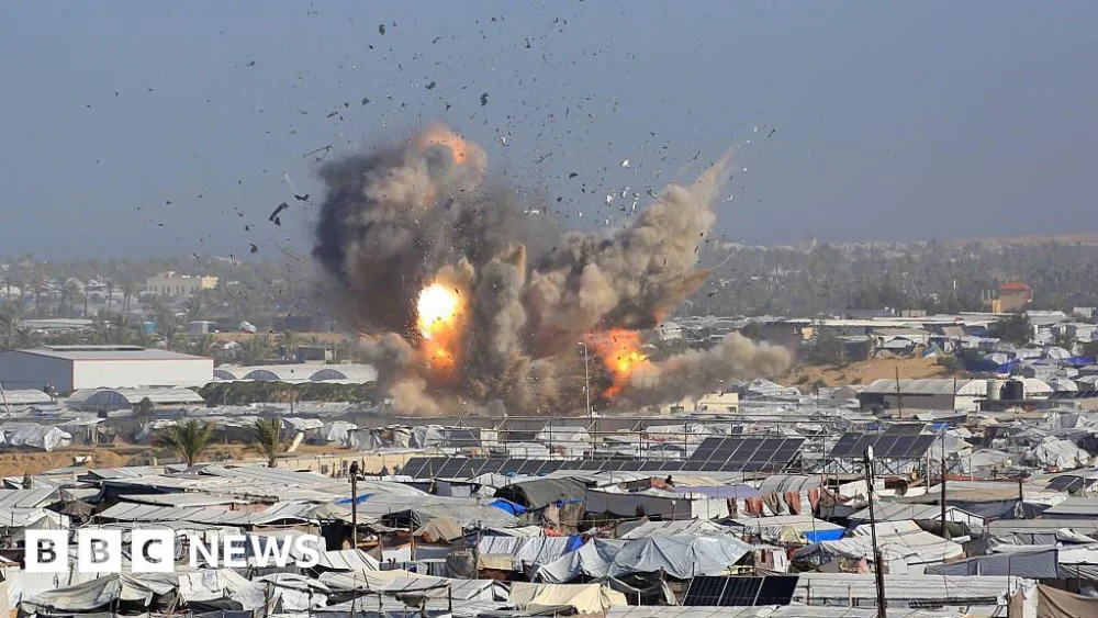 Israeli air strikes kill at least 32 Palestinians in Gaza, rescue officials say