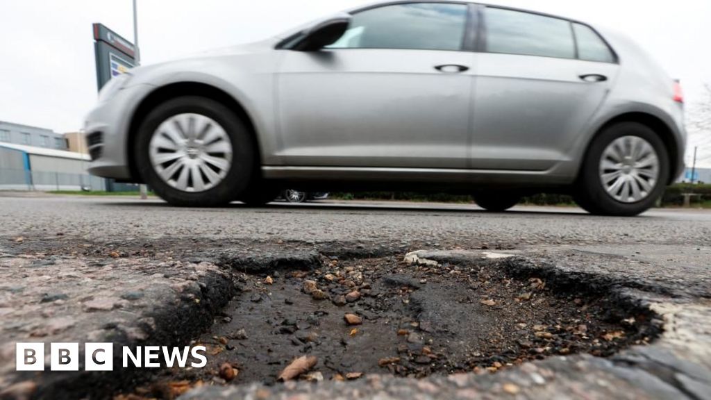 Potholes map rates council road repair progress.
