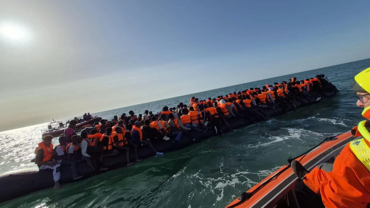 Record 230 people cross English Channel in one small boat